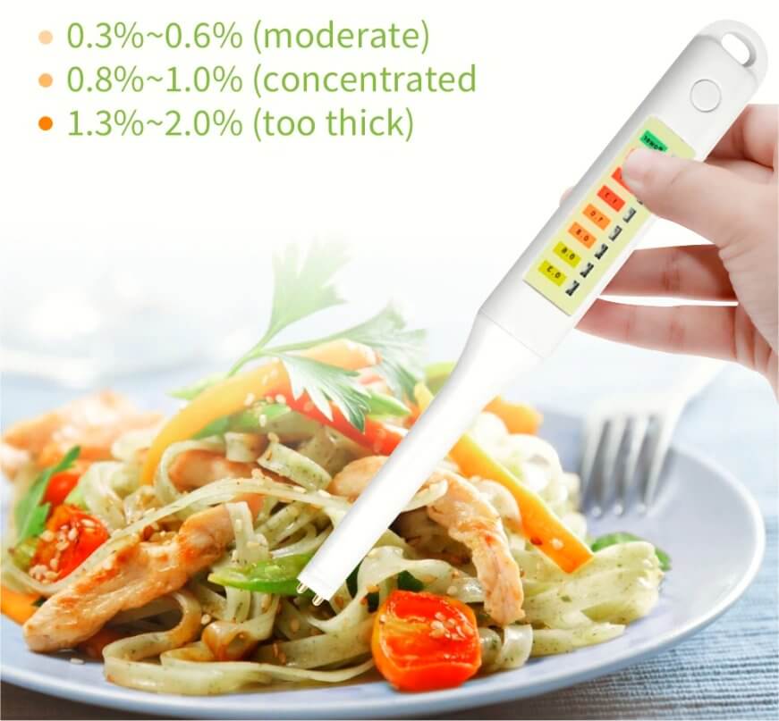 Testing Salt LED Electronic Food Salinity Tester measuring salt content in pasta ...